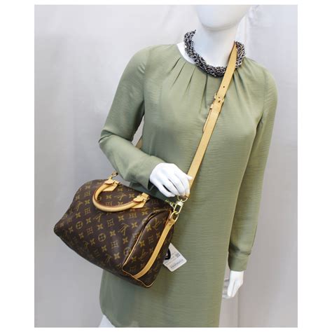 louis vuitton monogram canvas speedy bandouliere 25 bag